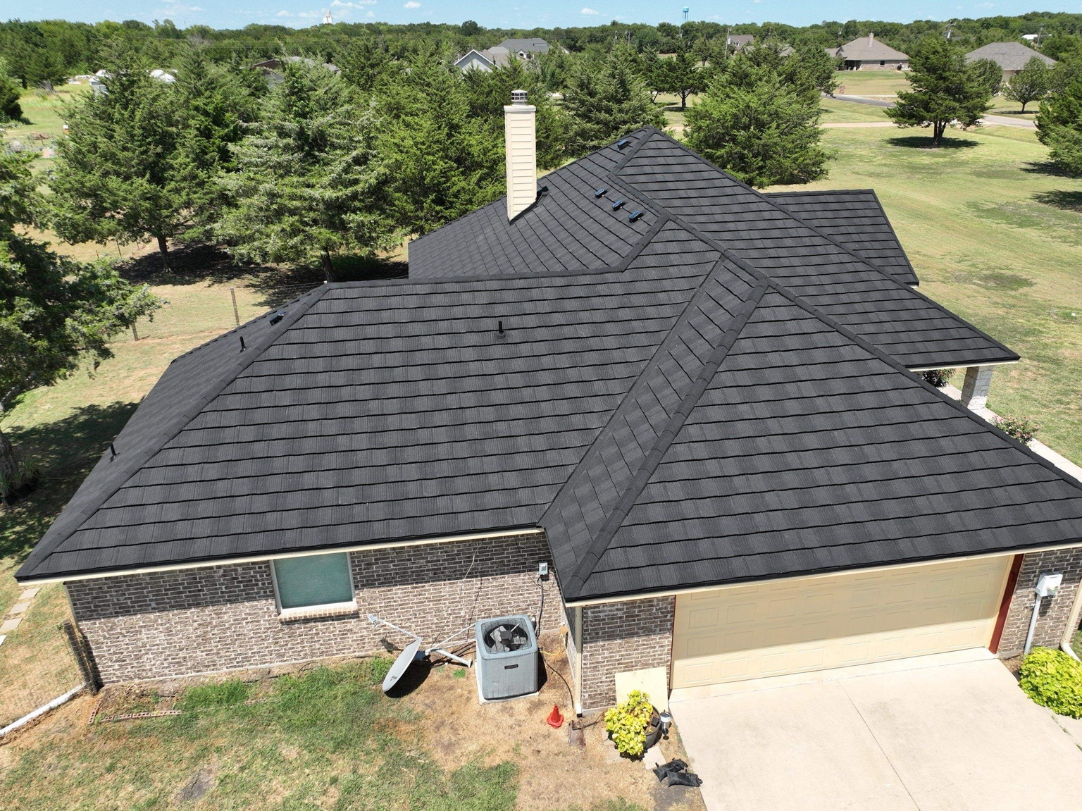 Stone-coated steel roof installed by Roofing With Nate