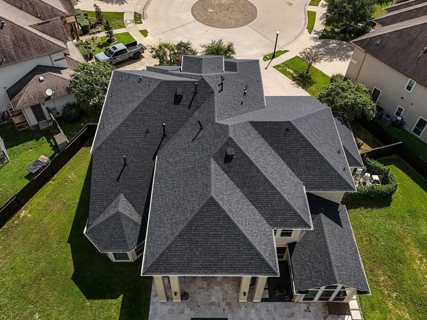 Drone view of completed gray shingle roof