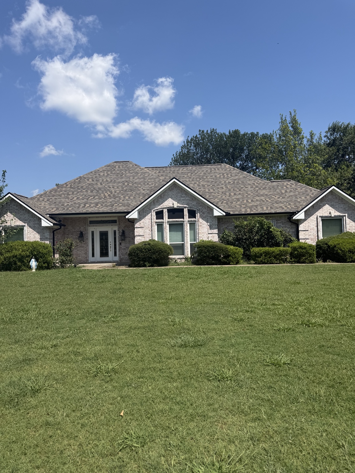 Completed home exterior with gutters