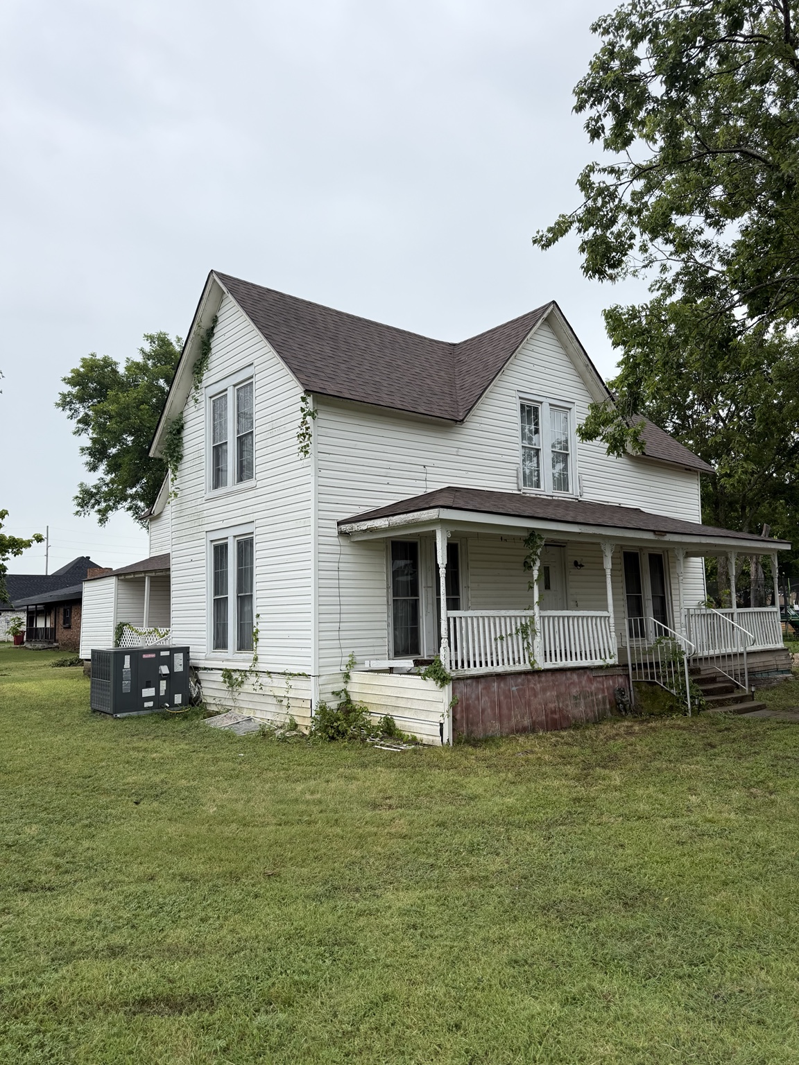 Traditional home with residential shingle roof